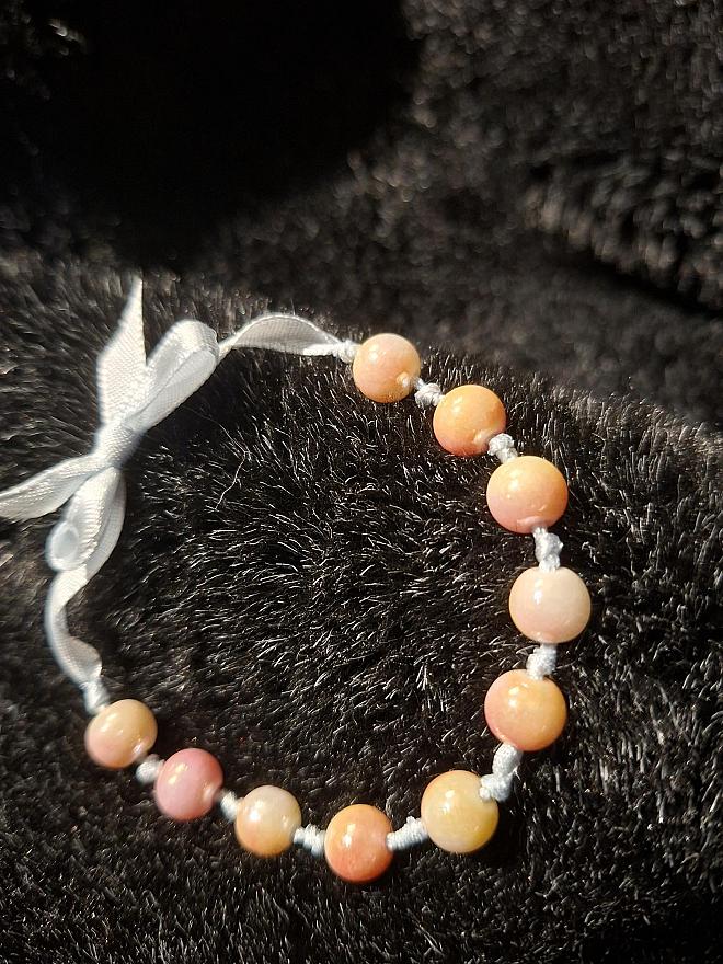 glasparels op blauw lint